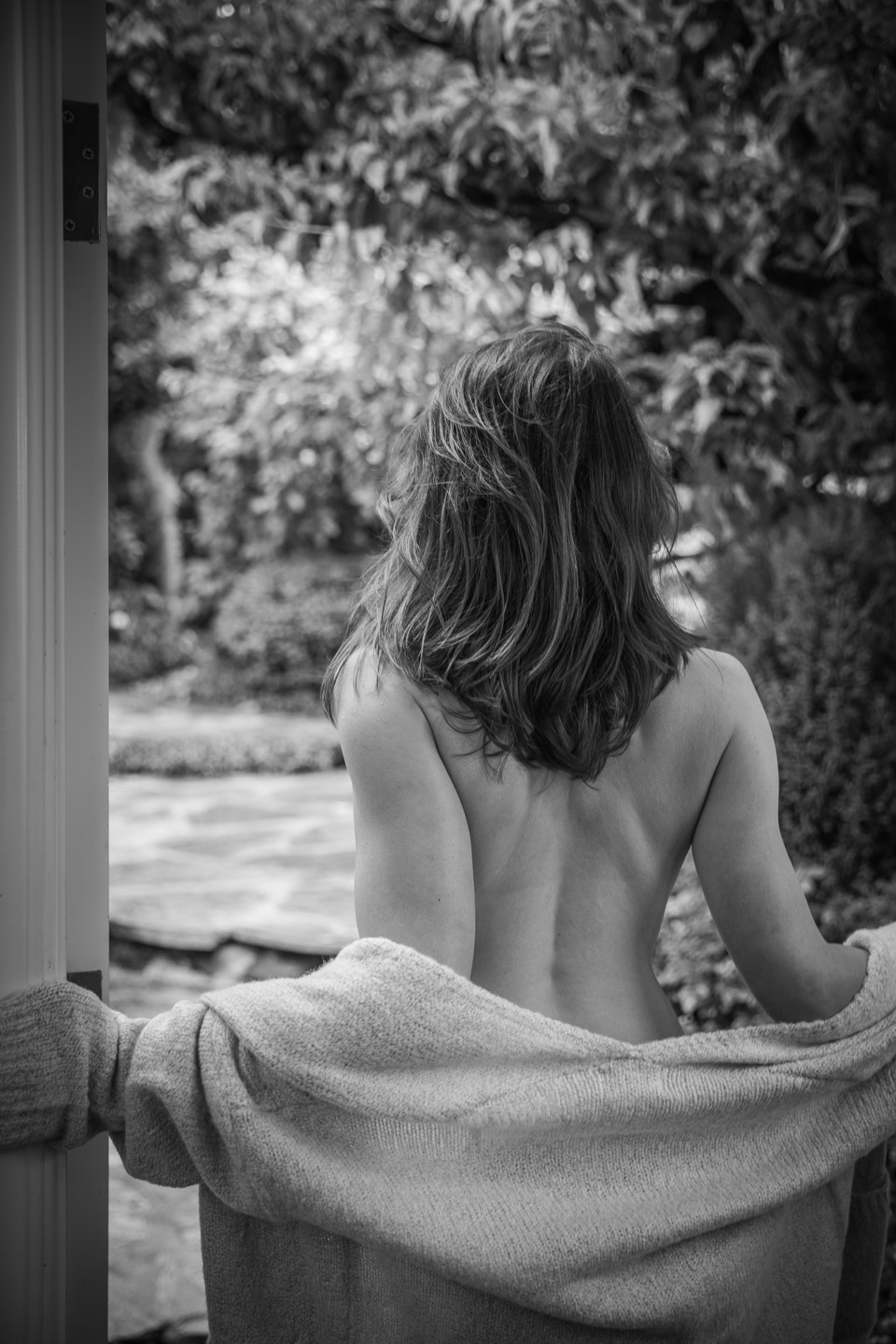 Fine-art boudoir portrait in natural light
